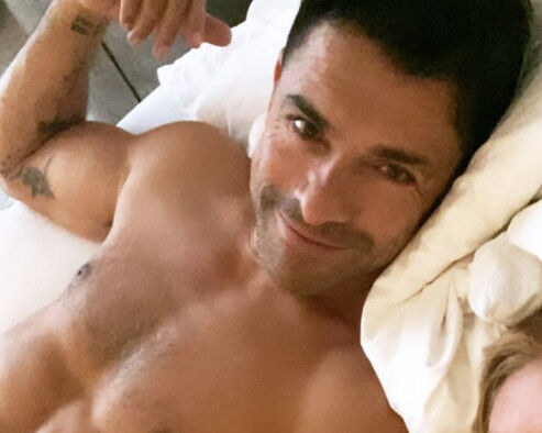 Kelly Ripa just posted a picture of Mark Consuelos in a cop uniform. We need to talk about his baton.