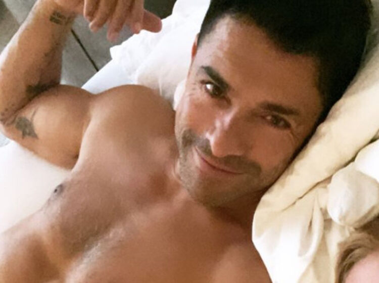 Kelly Ripa just posted a picture of Mark Consuelos in a cop uniform. We need to talk about his baton.