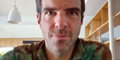 Zachary Quinto offers his six pack and manspread as a Thanksgiving appetizer