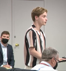 Gay high schooler suspended for nail polish tears into local school board at public hearing