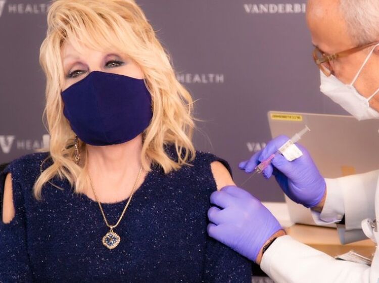 Dolly Parton gets Covid vaccine and tells people not to be  ‘cowards’ about it