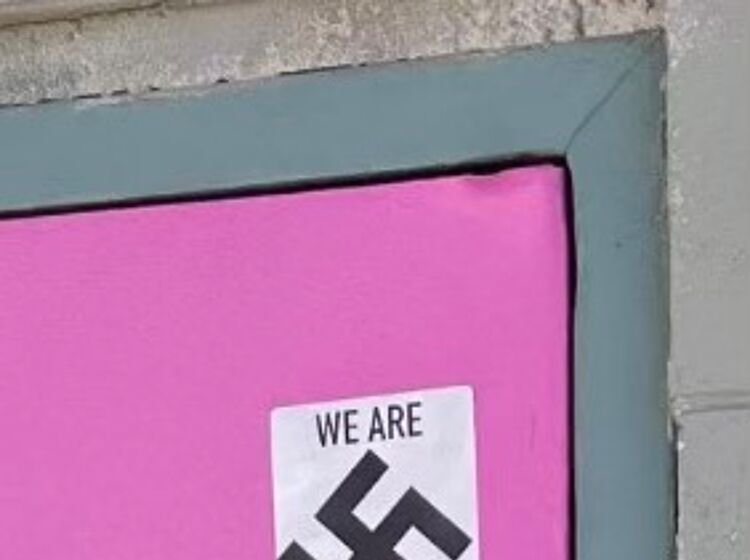 Alaska gay bar marked with swastika sticker reading “we are everywhere”
