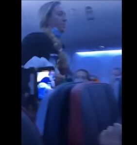 Passengers cheer as woman making anti-gay remarks gets dragged off plane