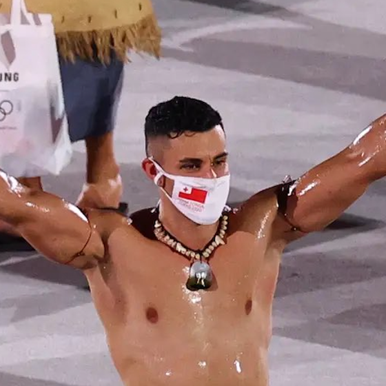 PHOTOS: Tongan flag bearer returns to Olympics, more oiled-up than ever