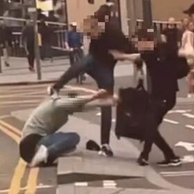 Gay couple pushed into oncoming traffic in horrifying attack