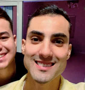 Volleyball star Douglas Souza and his boyfriend held for five hours by homophobic airport officials