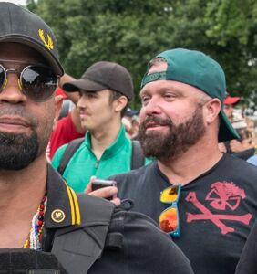 Proud Boys leader says members sometimes slap each other’s butts to resolve disputes
