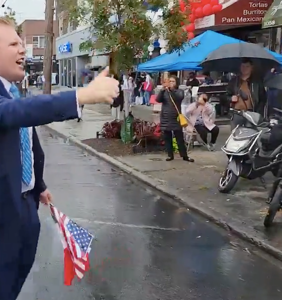 Literally nobody gives AF about Andrew Giuliani as he marches past them in rainy parade video