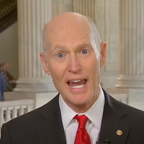 Football fans tell trans athlete-hating Rick Scott to politely STFU after his latest publicity stunt