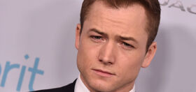 Taron Egerton gives thirsty fans an eyeful in just a towel