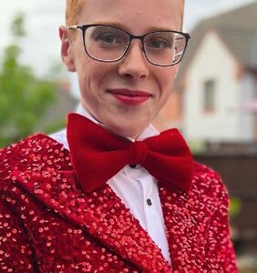 Schoolboy goes viral for wearing stunning red sequined dress to prom