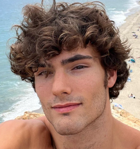Model Levi Conely’s barely-there bearskin thirst trap gives Burt Reynolds a run for his money