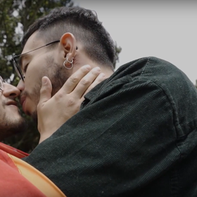 WATCH: Queer Colombians fight bigots with a rainbow-splashed “kiss-a-thon”