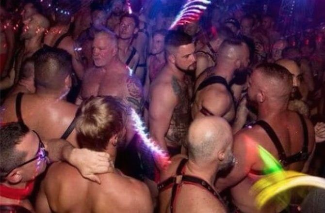 Shirtless revelers at The Eagle