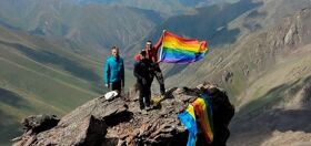 Gay climbers hoist a rainbow flag on Vladimir Putin mountain peak