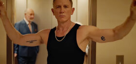 Daniel Craig ditches the tux and gives off tatted up leather daddy vibes