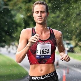 This queer runner just made history, and knows how to rock a harness