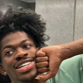 Lil Nas X embarks on journey to become tatted up muscle daddy by getting inked in Spain
