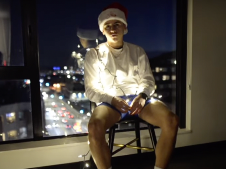 This naughty little elf just released a closeted gay version of Mariah Carey’s #1 Christmas hit