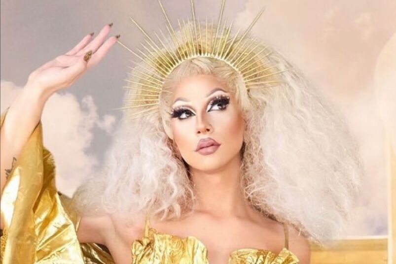'Rupaul''s Drag Race' queen Amethyst in a gold crown and gold lame dress.