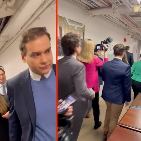 Video of George Santos racing down dead end basement hallway to escape reporters goes viral