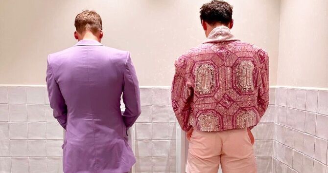 Tom Daley and Dustin Lance Black make a splash together at the urinals