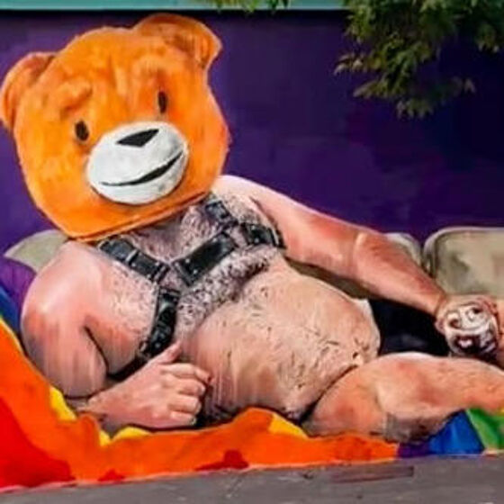 Homophobes absolutely lose it over Pride mural of man in leather harness and teddy bear head