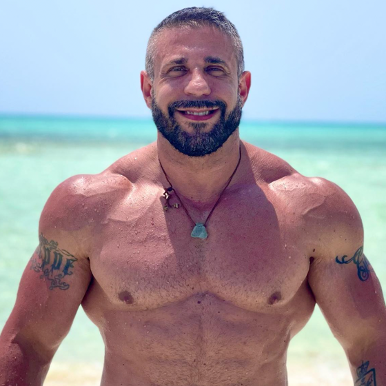 Muscle daddy professor wins case against university that fired him for his gay adult film past