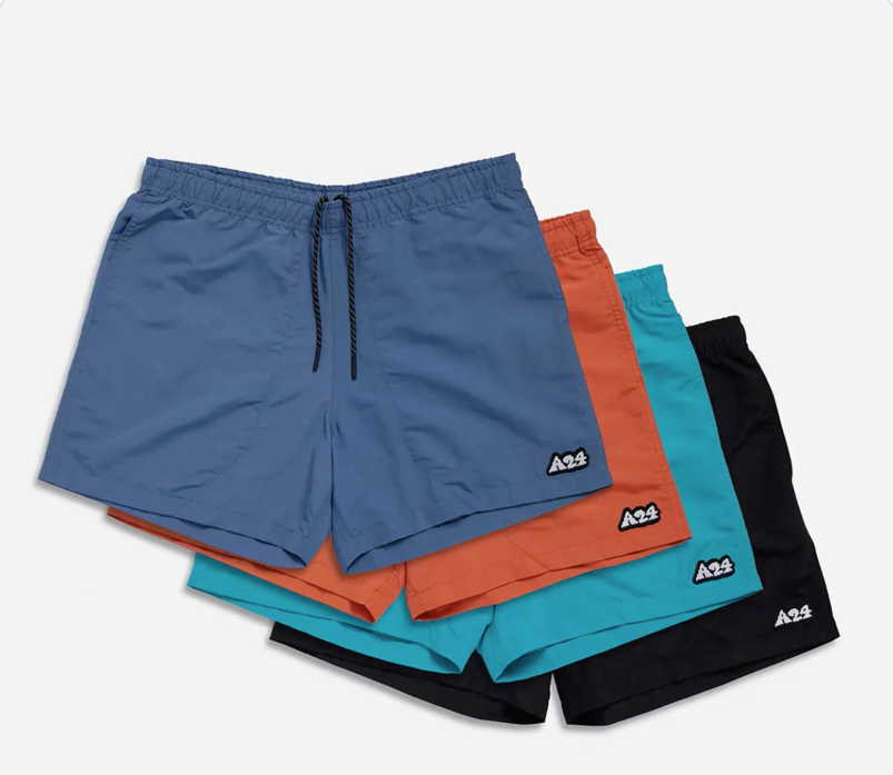 Blue, red, teal and black gym shorts piled on top of each other.