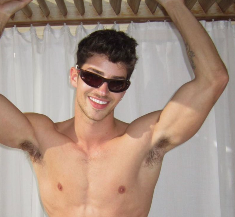 Manu Rios shows off his armpits and abs in shirtless selfie