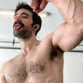 This hunky TikTok creator loves video games, comedy, & showing off his pecs