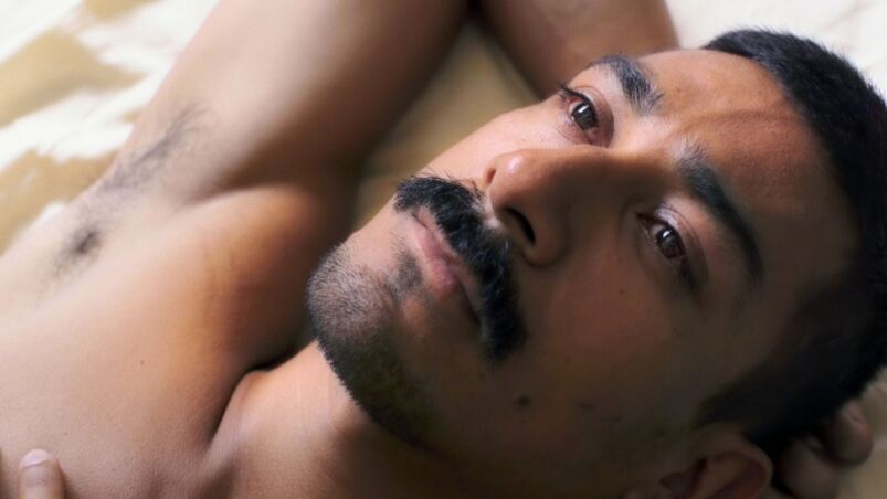 Lalo Santos is shirtless and pensive in 'Pornomelancholia'