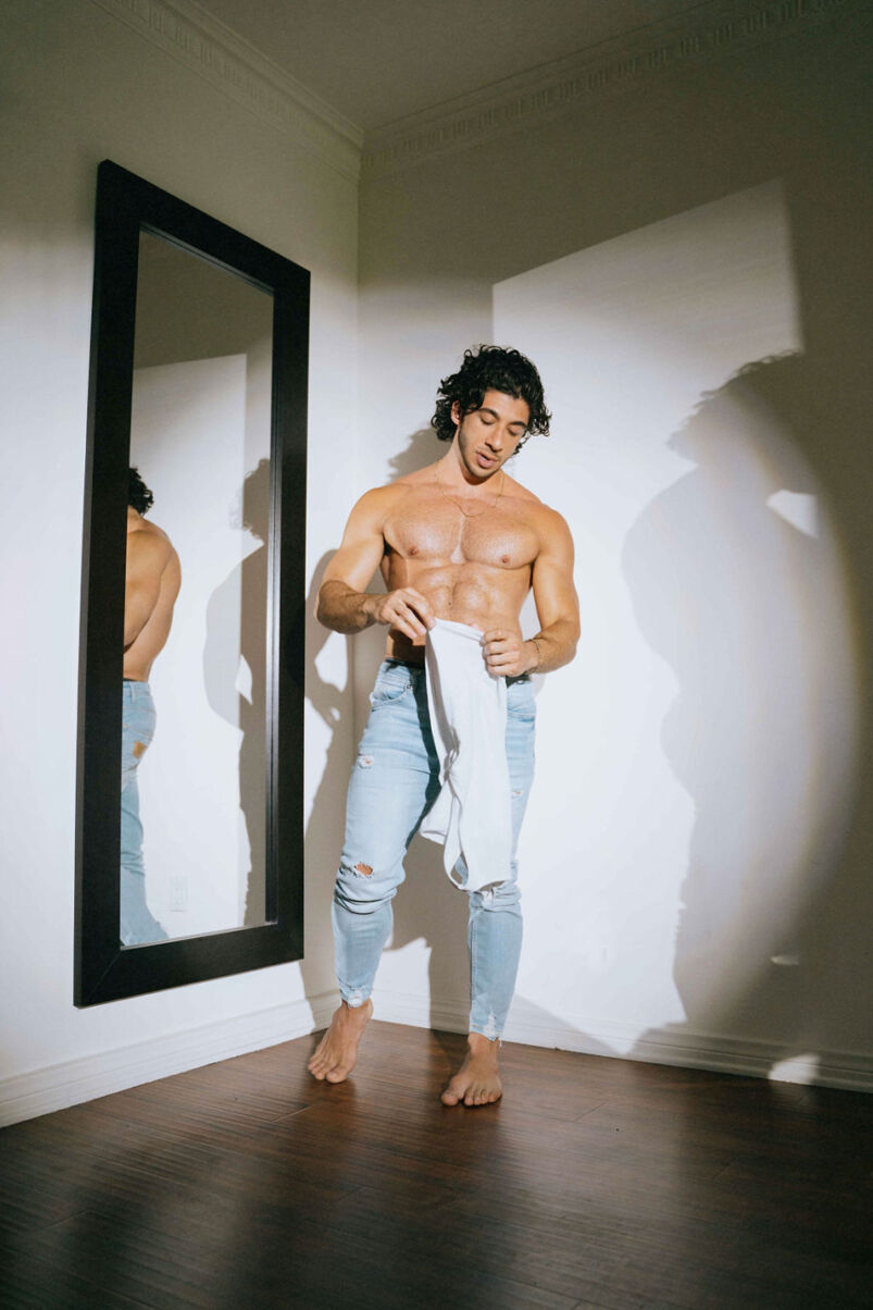 Vasilios Filippakis poses shirtless in jeans