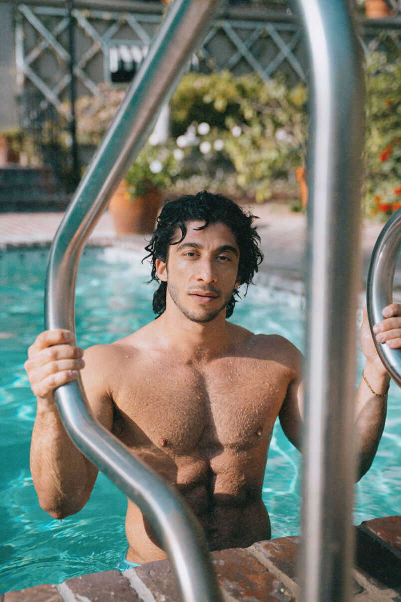 Vasilios Filippakis poses in a pool
