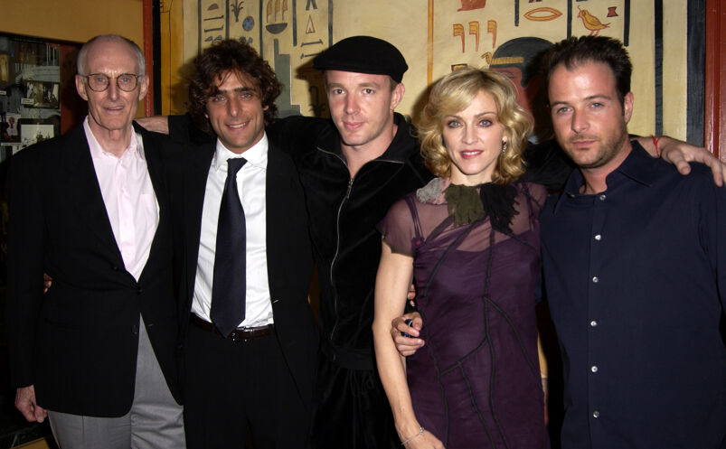 Gareth Wigan, Adriano Giannini, Guy Ritchie, Madonna, and Matthew Vaughn smile while posing together at a screening for 'Swept Away.'