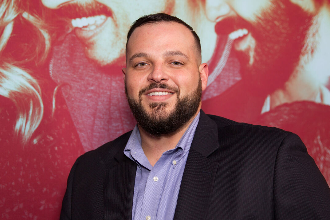 Daniel Franzese smiles on the red carpet for the 'Looking' Season 2 premiere.