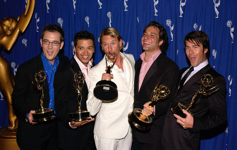 Ted Allen, Jai Rodriguez, Carson Kressley, Thom Filicia, and Kyan Douglas smile holding Emmy statuettes at the 2004 ceremony.
