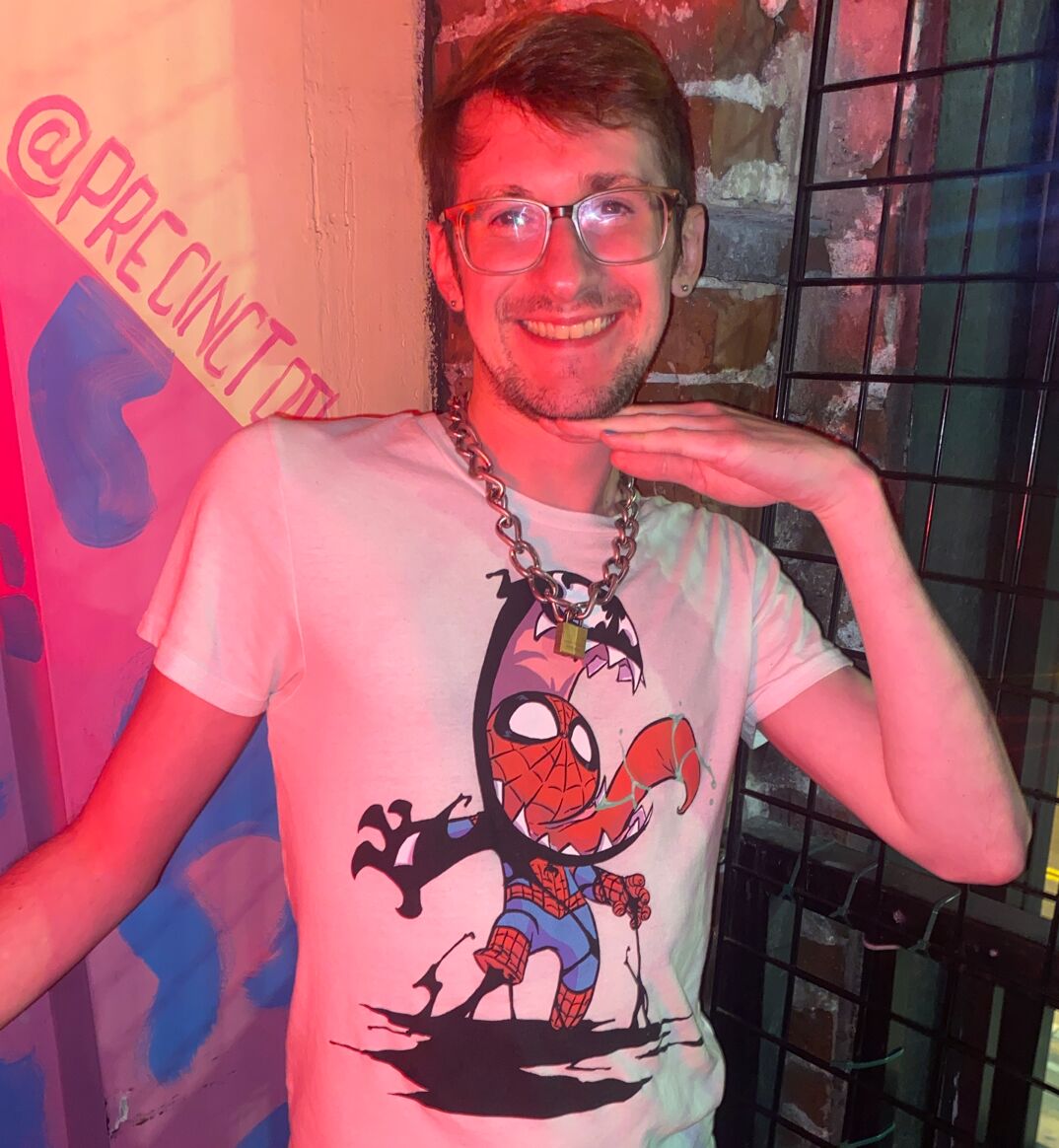 Ethan in a Spider-Man symbiote t-shirt.