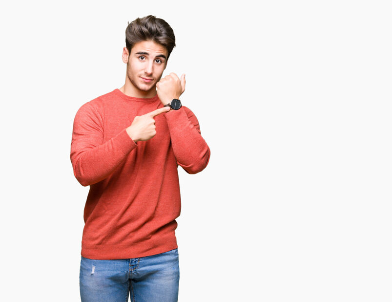 A man pointing at his watch. 