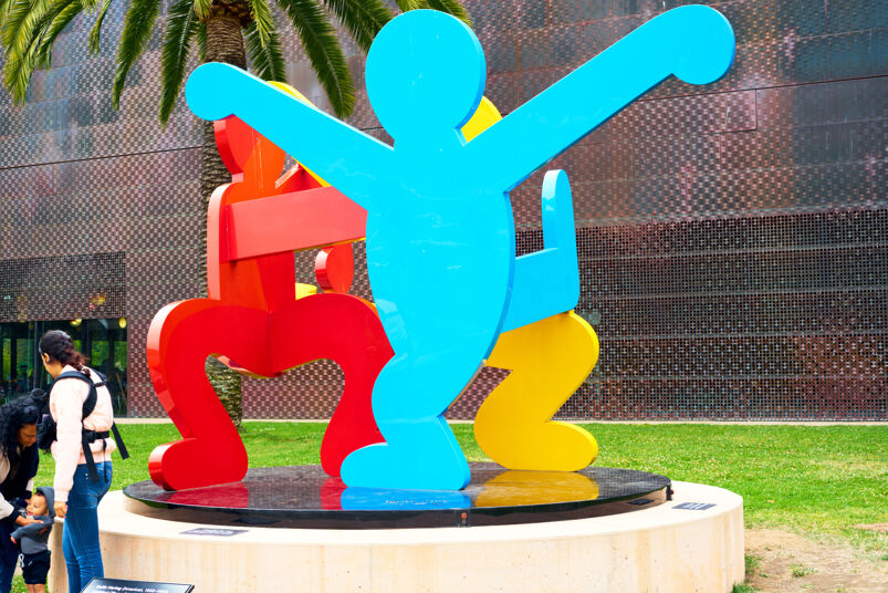 A sculpture by Keith Haring at the entrance of San Francisco's de Young Museum.