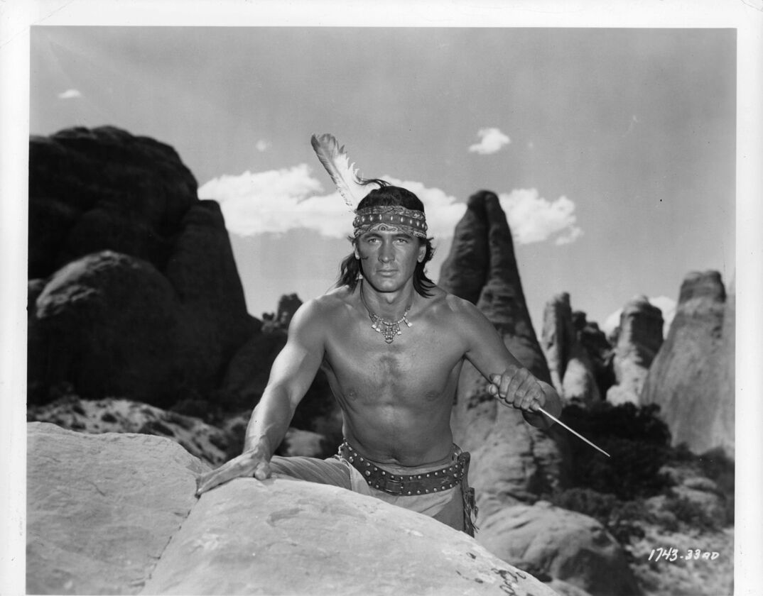 Rock Hudson holds a knife in a scene from the film 'Taza, Son Of Cochise', 1954.