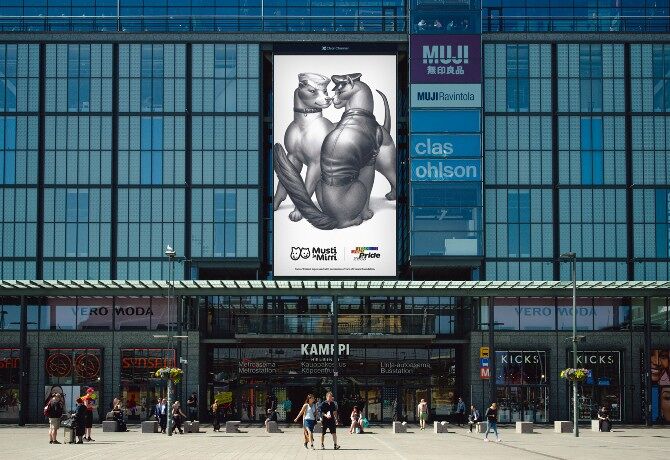 A Tom of Finland inspired poster in Helsinki featuring a cat and dog