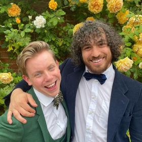 Gay rugby player Devin Ibañez & his boyfriend went to their first wedding together & looked absolutely adorbs