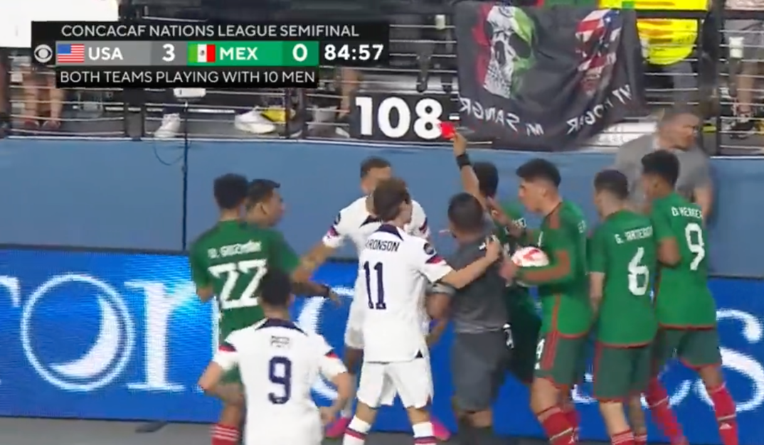 U.S. and Mexico soccer players in a skirmish.