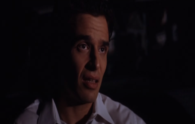 Antonio Sabáto Jr. looks off judgmentally in a dark car in 2003's 'Testosterone.'
