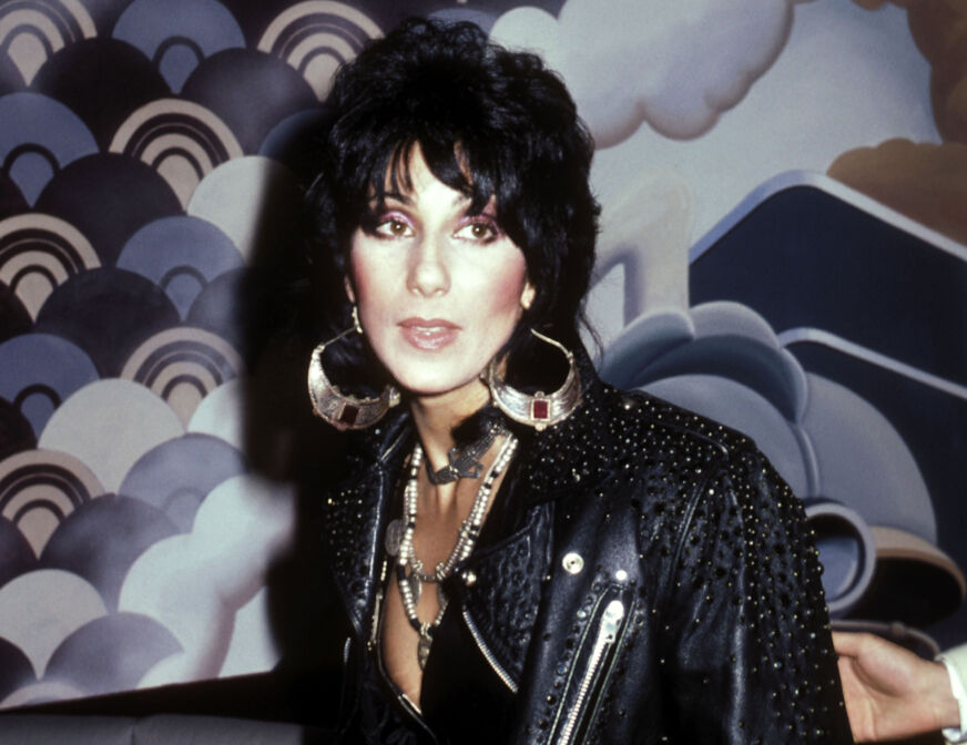 Cher wears leather in a press photo from 1980.