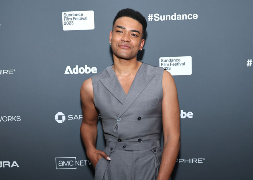 Owen Thiele in a grey sleeveless suit at Sundance