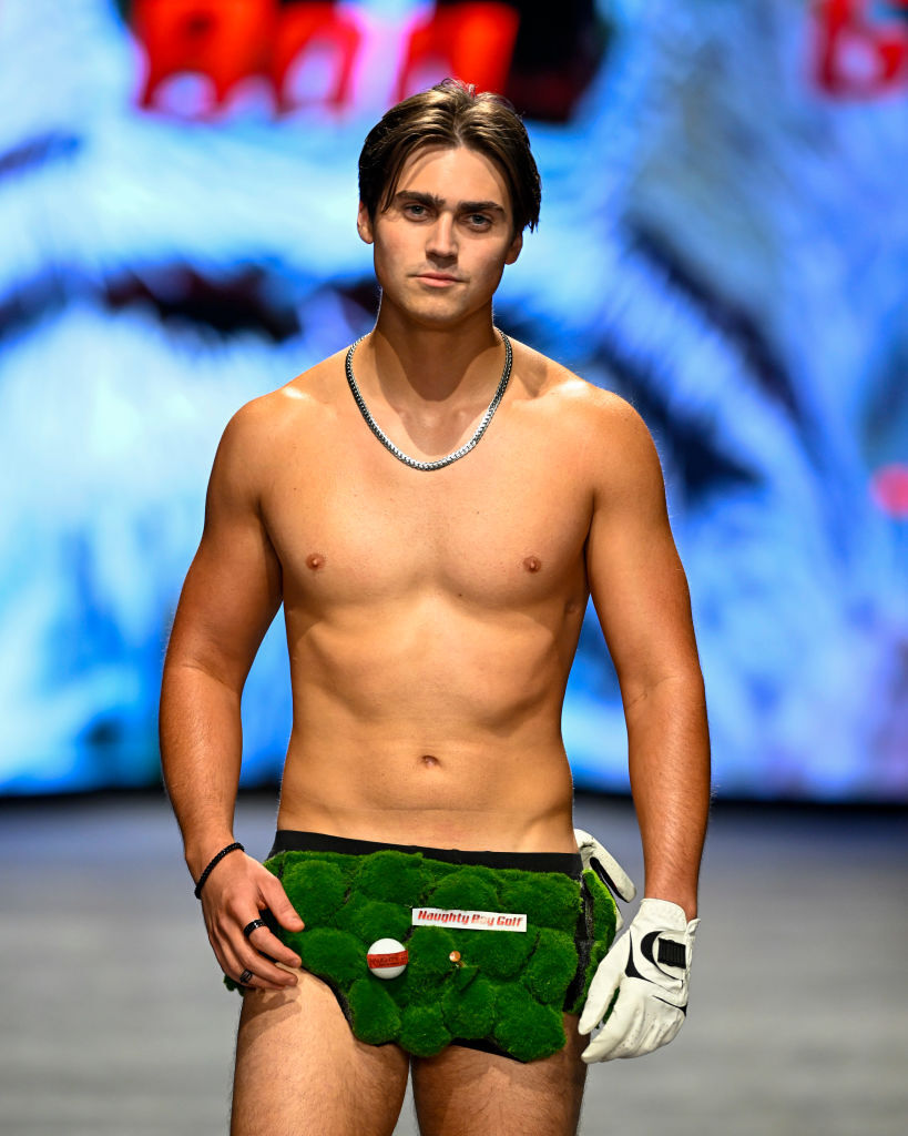 Male model in astroturf swimsuit