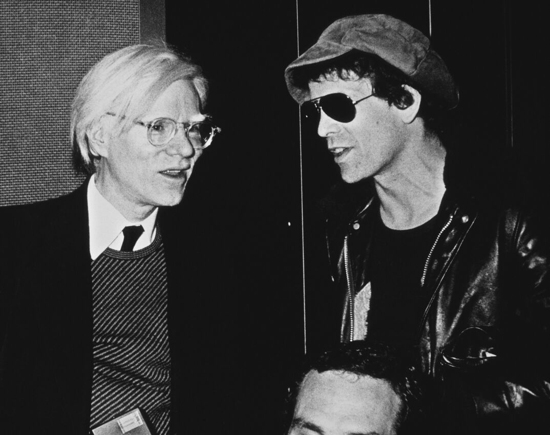 American pop artist Andy Warhol (1928 - 1987, left) with singer-songwriter Lou Reed (1942 - 2013), circa 1980. (Photo by Richard E. Aaron/Redferns/Getty Images)