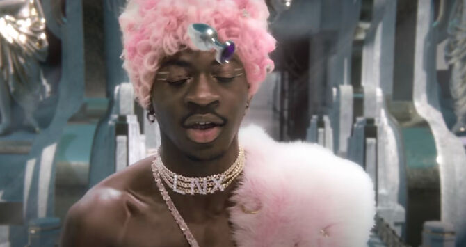 Lil Nas X is hit by a silver butt plug in the 'Montero (Call Me By Your Name)' video